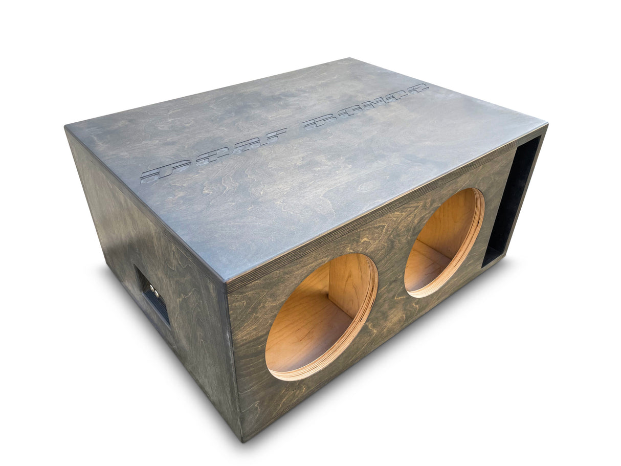 A custom built enclosure for dual 10-inch subwoofers with a gray stained finish and a ported design.