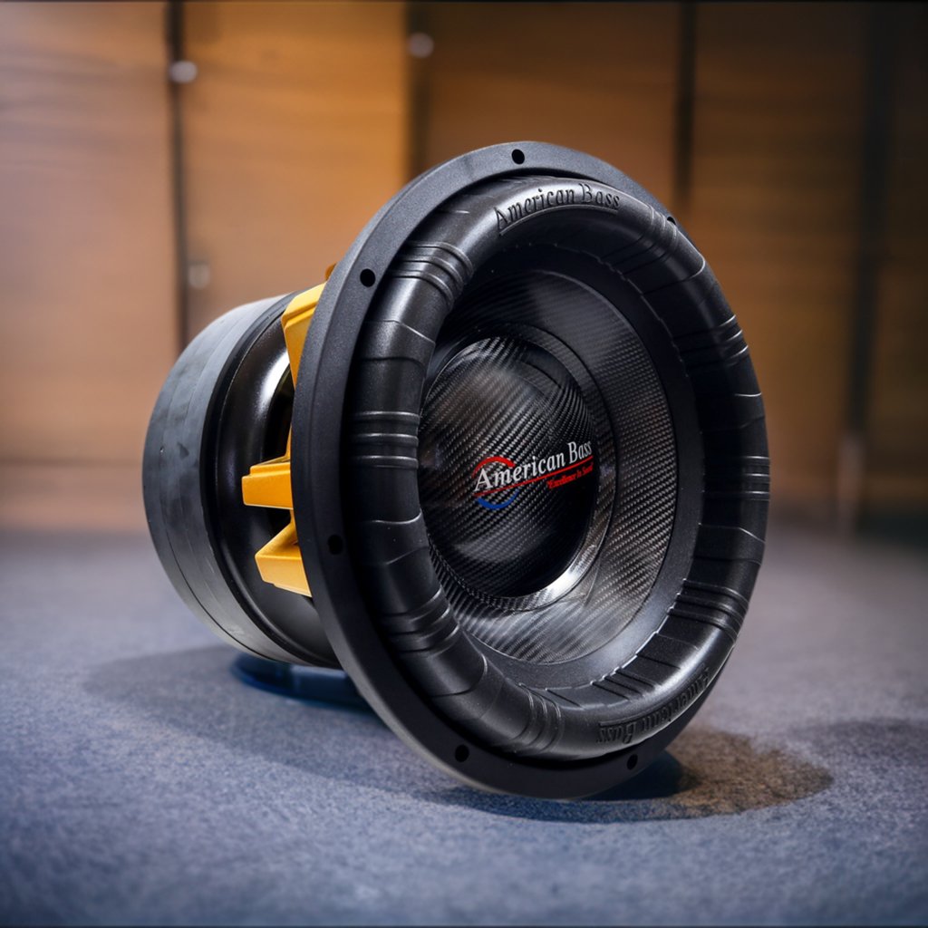 An American Bass King 12" Subwoofer with a black and yellow color scheme, featuring a central dome and a large surrounding cone.