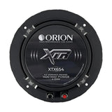 Angled rear-side view of the Orion XTX654 6.5" midrange speaker, capturing both the rear ferrite magnet assembly and part of the cone with its silver bullet phase plug. The image highlights the open basket design, rear cooling vents, and terminal connectors, giving a clear look at the speaker's power-handling and build features. Ideal for LibertyBassShop.com to show off the speaker's performance-ready construction.
